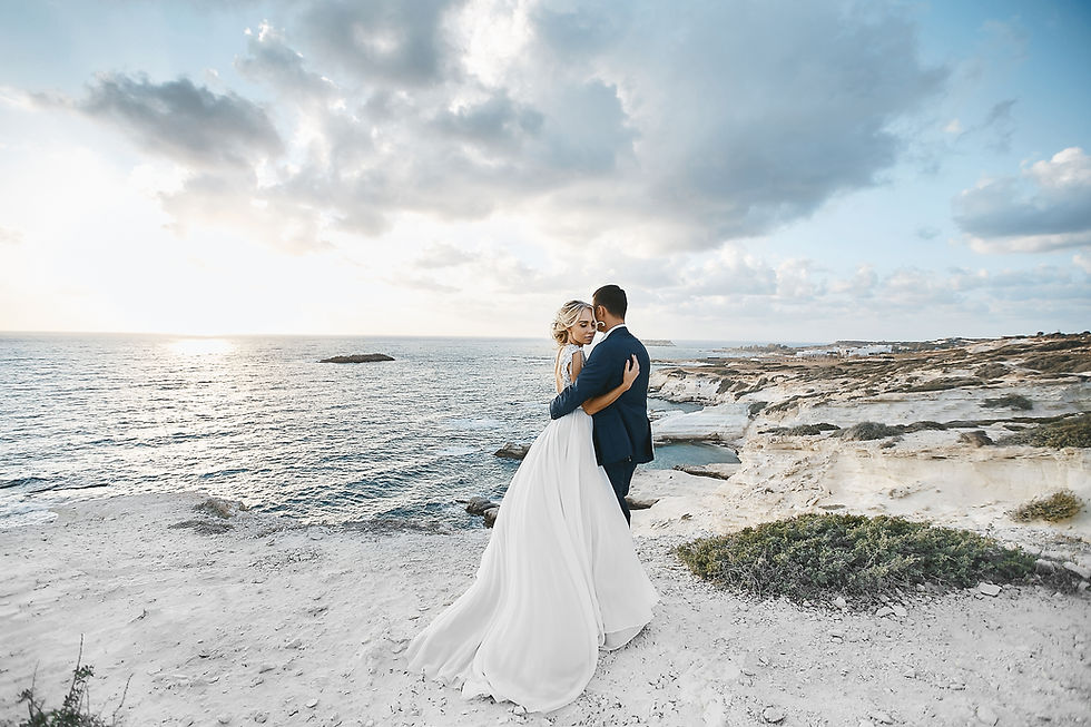 newlywed-couple-hugging-together-white-r