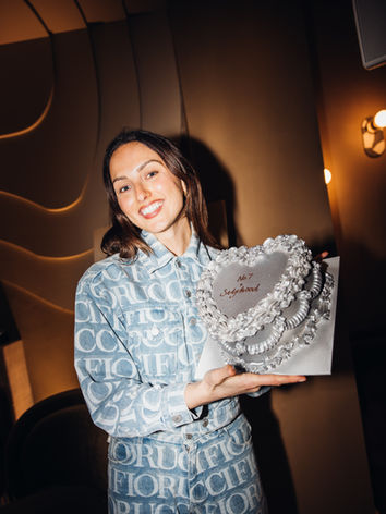 Event Photographer London CEO holding cake