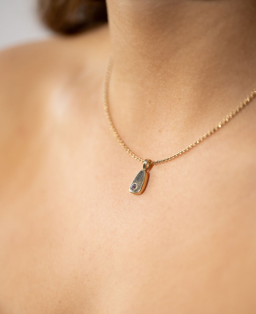 Gold necklace with tear-drop pendant