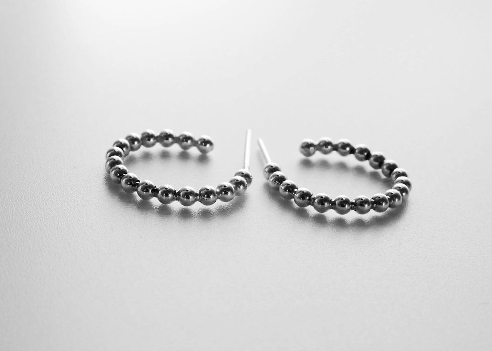 Thumbnail: Silver balls hoops earrings