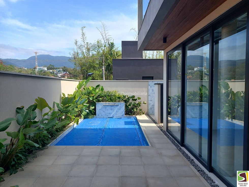 Casa a venda em Ilhabela, de condomínio, 4 suítes, Vista ao Mar, Itaguassu