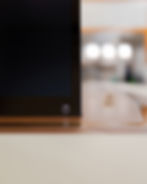 Close-up of an Arthur Holm screen/monitor popping out of a conference table