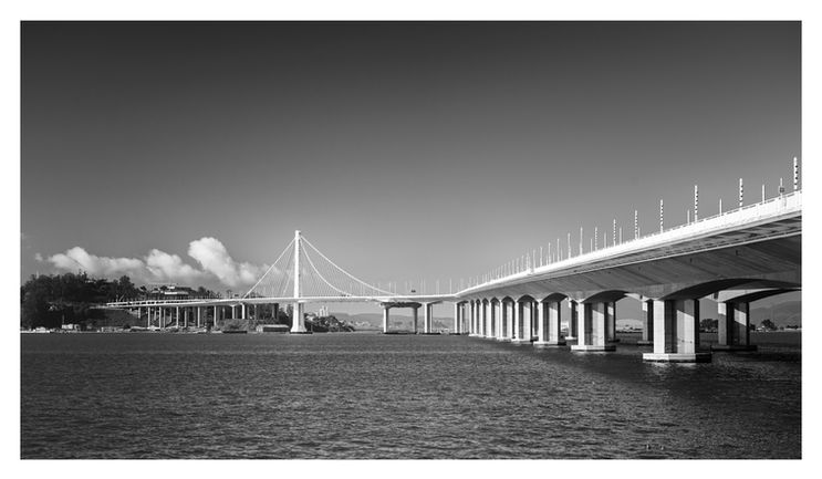 Black and white fine art photograph of the new eastern span of the Bay Bridge connecting Oakland and Yerba Buena Island by Alfred Hodgson