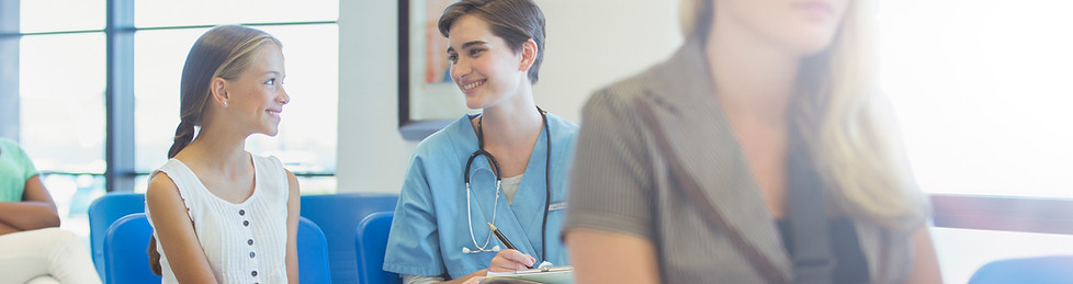 Nurse And Patient In Waiting Room