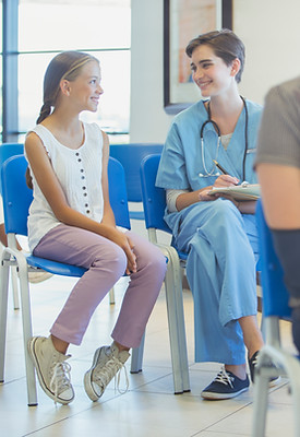 Nurse And Patient In Waiting Room