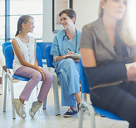 Nurse And Patient In Waiting Room