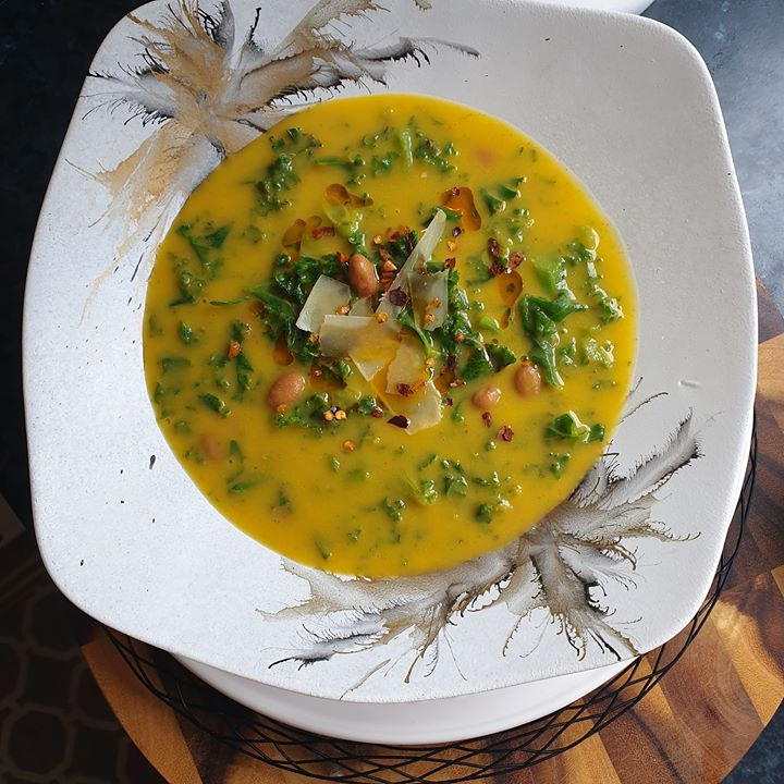 Creamy Kale and Pinto Bean Soup with Prosciutto and Parmigiano Reggiano