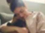 Jodie holding a fluffy puppy