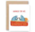 White greeting card with an illustration of two sardines sitting up in a red and yellow tin while cheersing with martinis. The card says Here's to Us.
