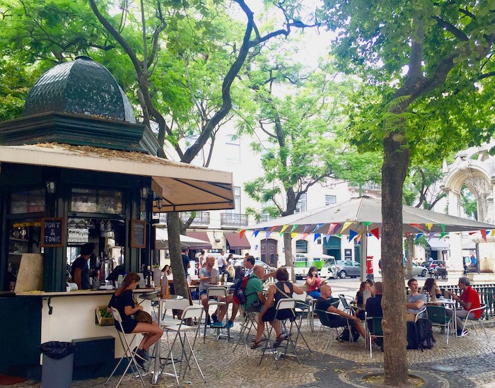 A lively outdoor cafe in Lisbon, Portugal