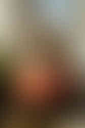 Facing the red front of the traditional Sintra tram