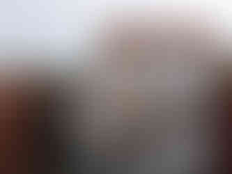 Vhils portrait mural in Fort Smith, Arkansas of a Cherokee Indian