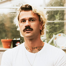 blonde-man-his-his-greenhouse.jpg