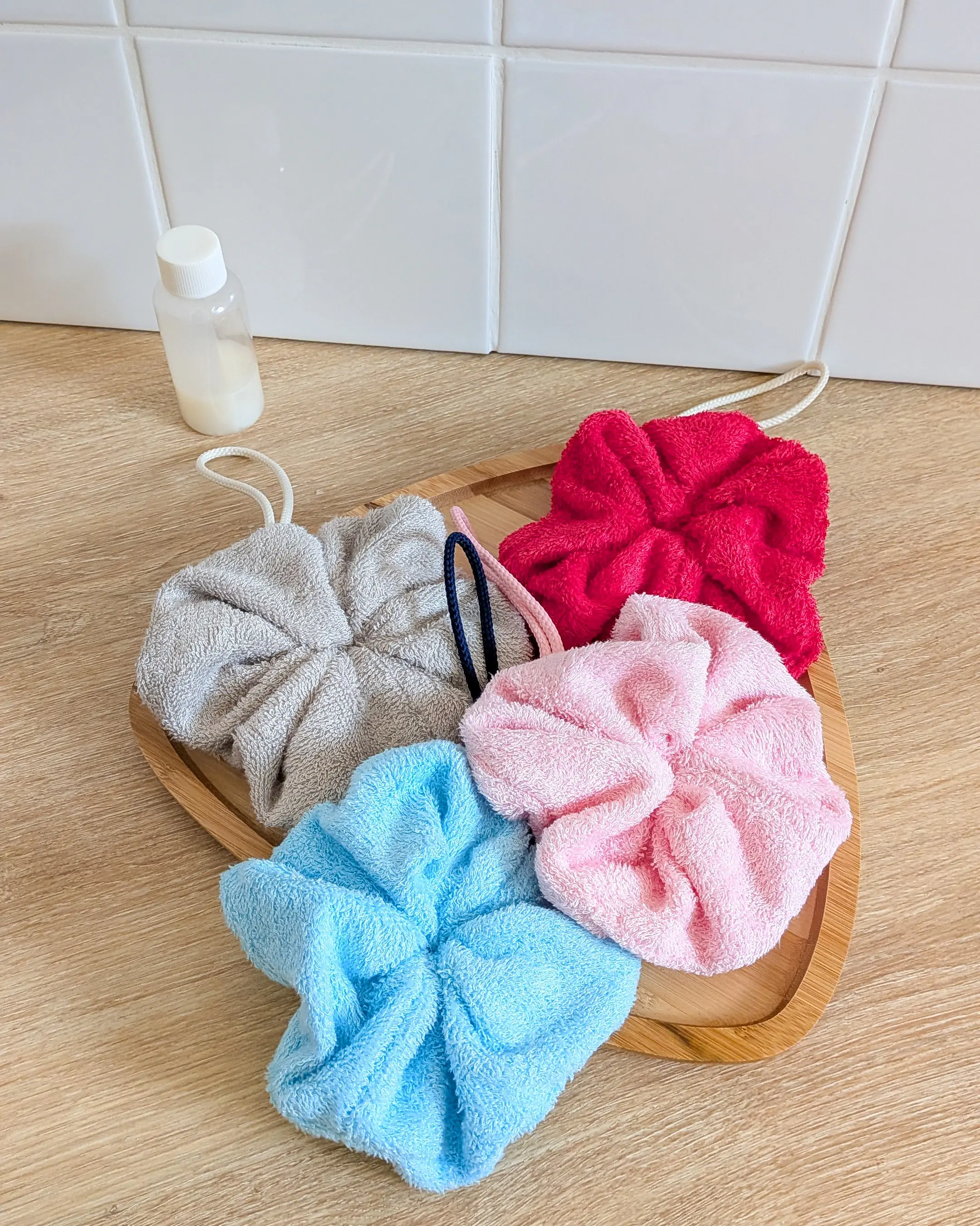 Fleurs de douche en éponge