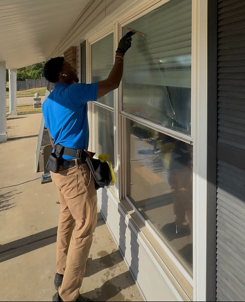 Me Cleaning with squeegee_edited.jpg