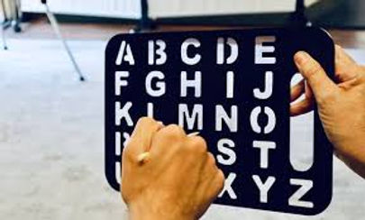 Board with hand and pencil pointing.jpg