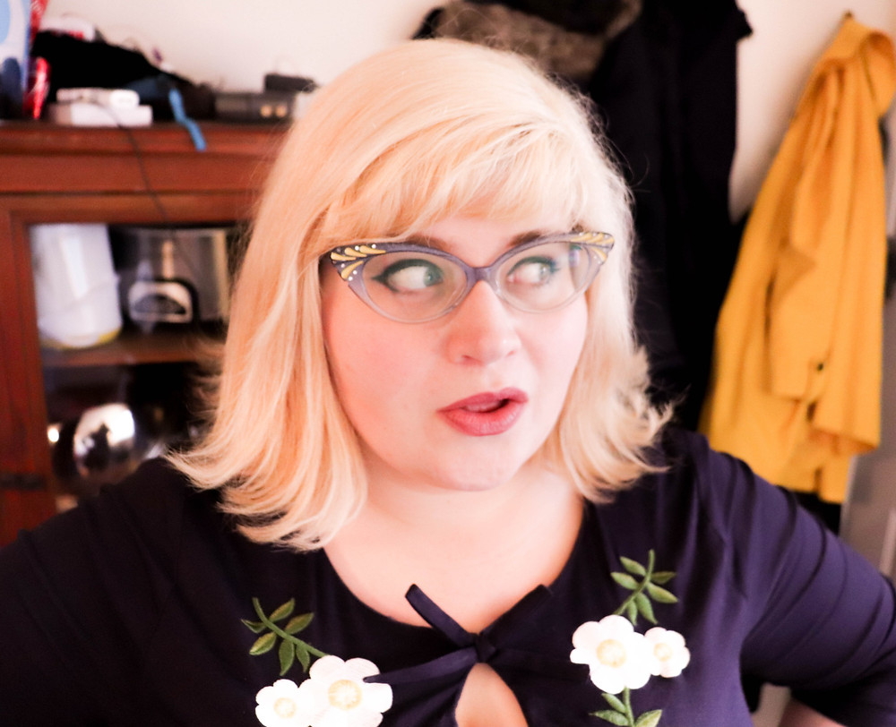 blonde woman looking to the right