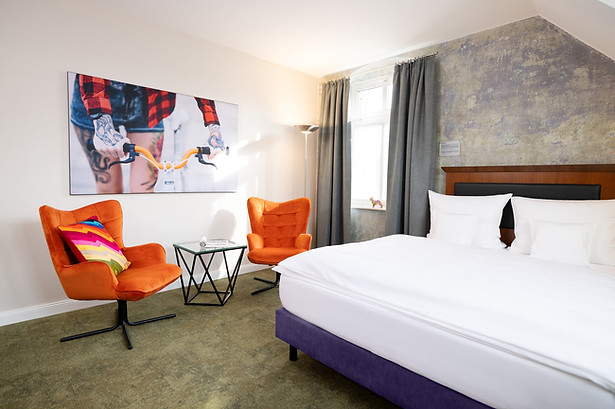 Hygienisch reine und perfekt gemangelte Hotelbettwäsche für erstklassigen Schlafkomfort in Hotels und Ferienwohnungen