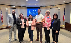 Debi Tanton and three members of the Irving ISD professional learning team holding their PL awards. 