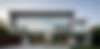freepik_edit_modern-house-with-floortoceiling-mirrorfoil-window_edited.jpg