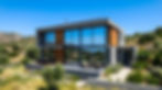 freepik_edit_A-sleek-modern-house-with-large-windows-covered-in(4).jpeg