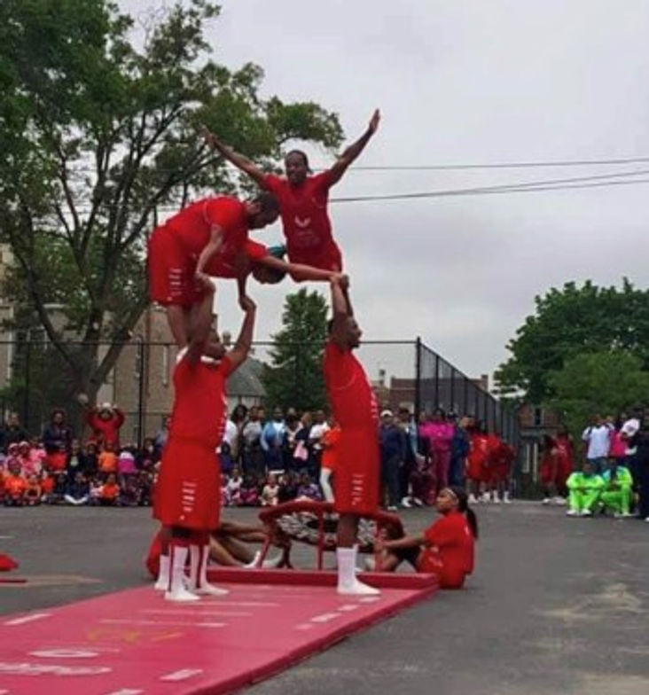 Performing at a tumbling show with my team (I’m flying over).