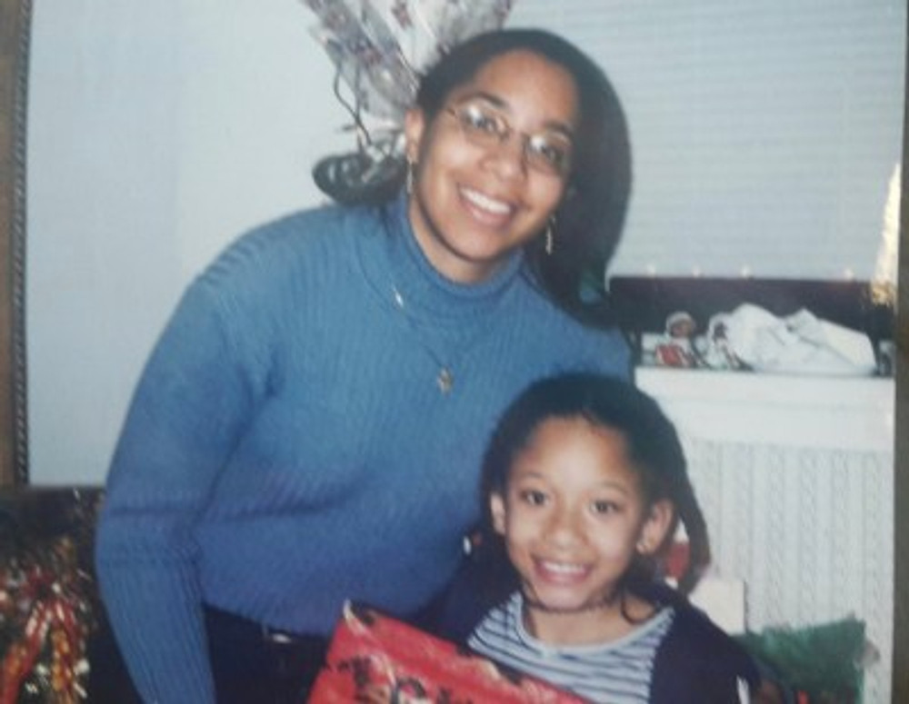 With my older sister at Christmas time.