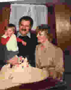 Me with my parents on my first birthday, 1983.