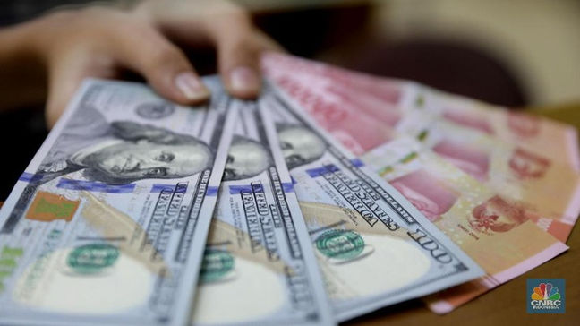 PT Solid Gold Berjangka | Dolar AS Sedang Babak Belur, Rupiah Bisa ke Rp 14.000/US$?