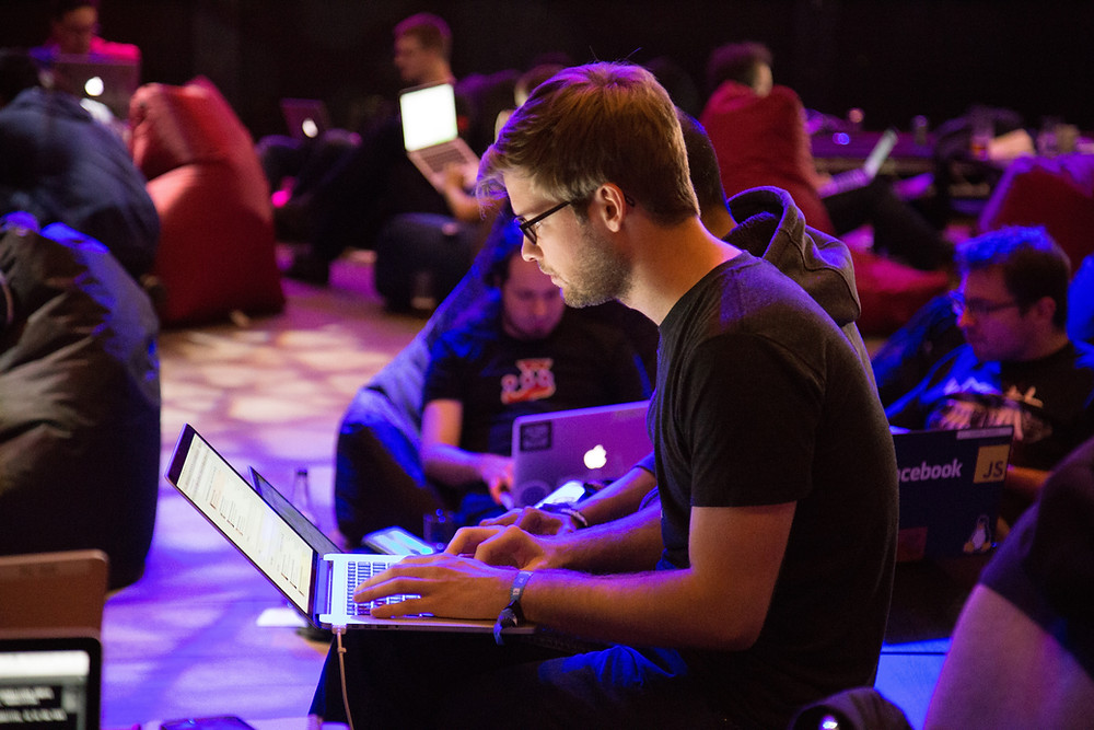Conference audience on laptops