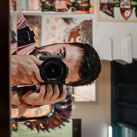 a man taking a picture of himself in a mirror_edited.jpg