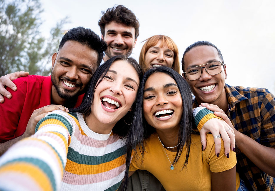 Multiracial friends group having fun taking selfie - Happy people hugging and posing for p