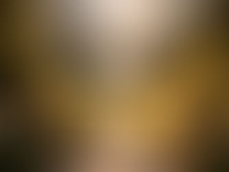 Sunlit stone steps descend into a vast mountain valley, framed by lush greenery and tall evergreens, with a winding river leading the eye toward distant peaks glowing in soft morning light, conveying a sense of being gently led forward into a wide, open horizon.