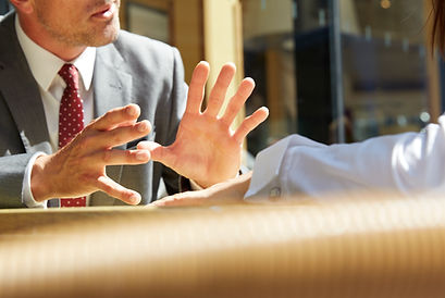 A Legal Team Member Talks to a Client or Coworker