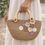 Miniature : Sac panier fleuri en jute porté à la main