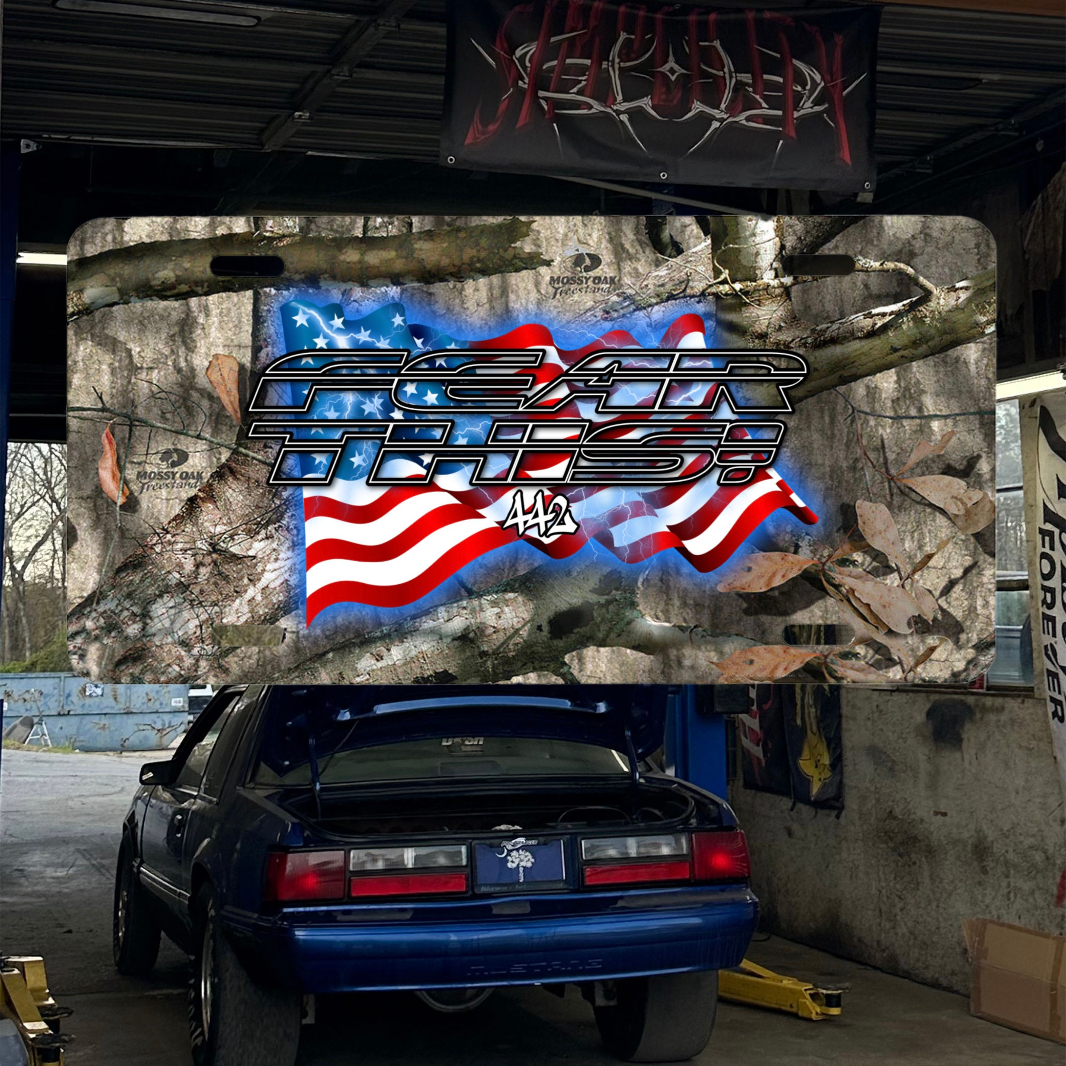 “Fear this” woods camo vanity plate 