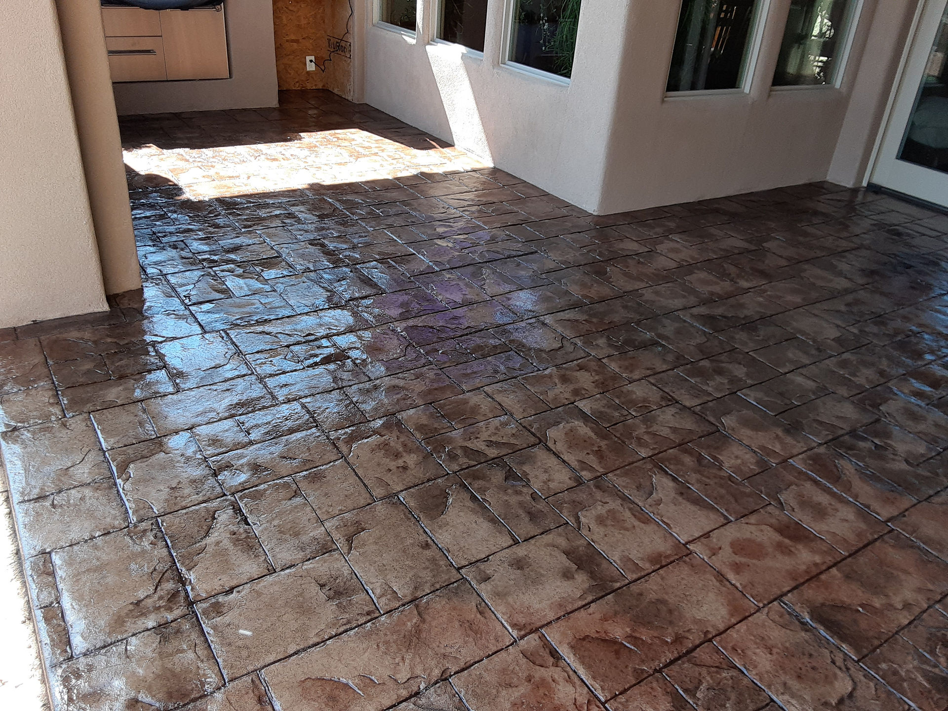 Stamped concrete in backyard patio