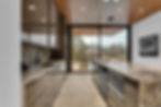 Modern custom kitchen designs with marble counters and wood ceiling