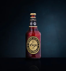 Shepherd Neame Kentish Strong Ale drinks product photography with glass and straw, Ayrshire Scotland