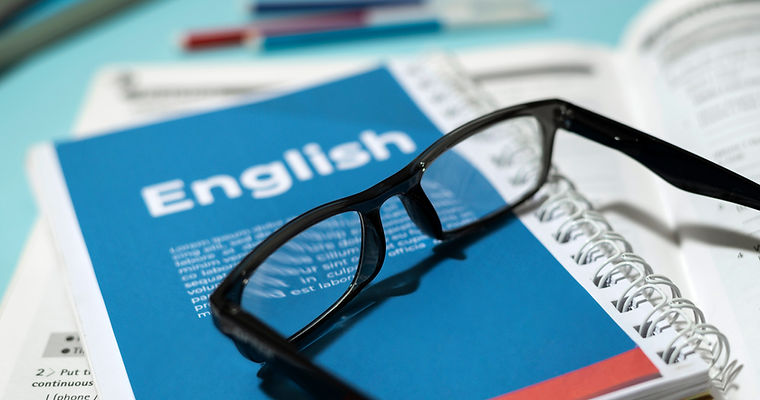 english-book-with-glasses-table