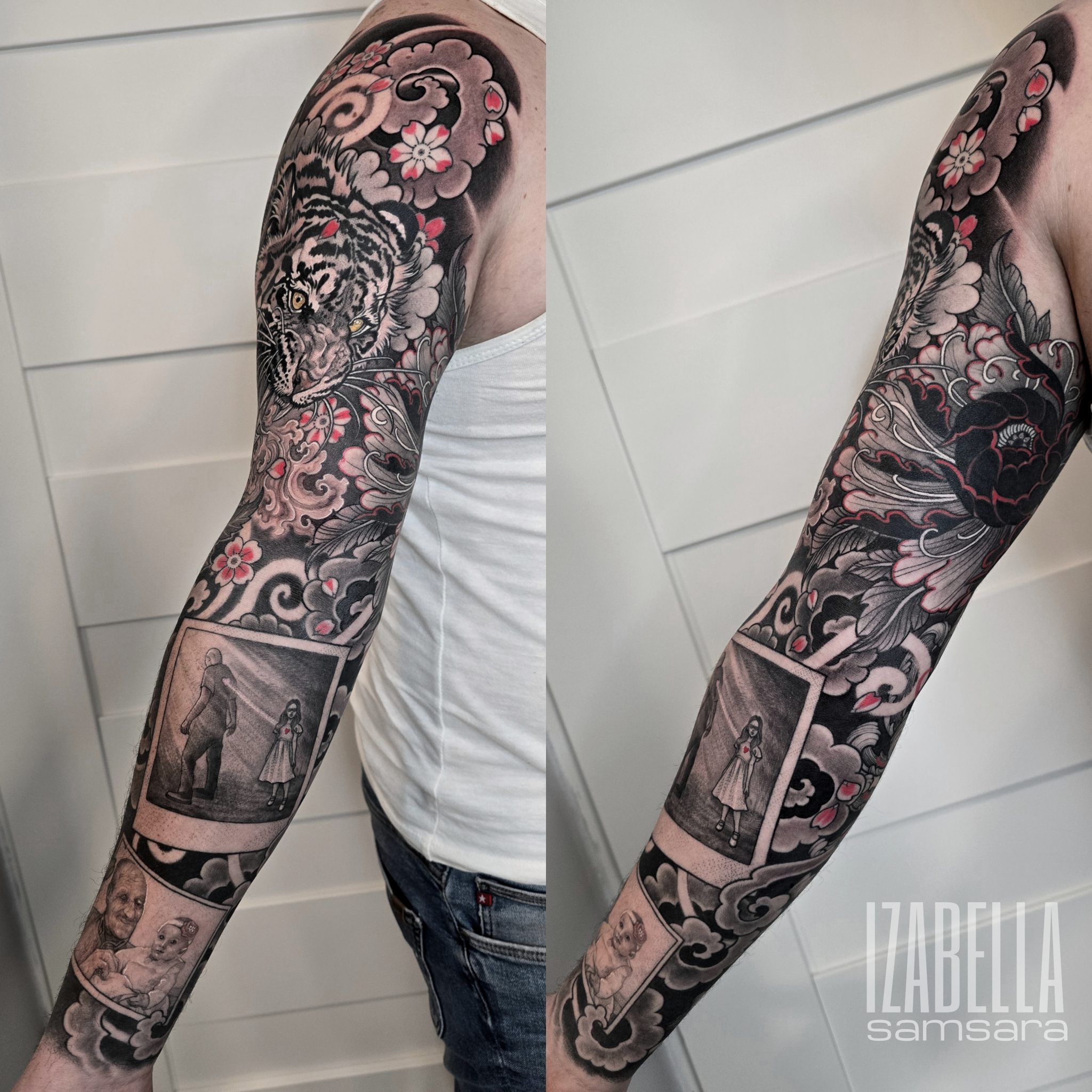A full sleeve tattoo featuring a detailed black and gray depiction of a tiger surrounded by floral elements and swirling patterns. The design includes vintage-style portraits framed in cloudy shapes, showcasing a girl in a white dress, a man holding her hand, and a portrait of a woman with a child, all interspersed with colorful cherry blossoms.