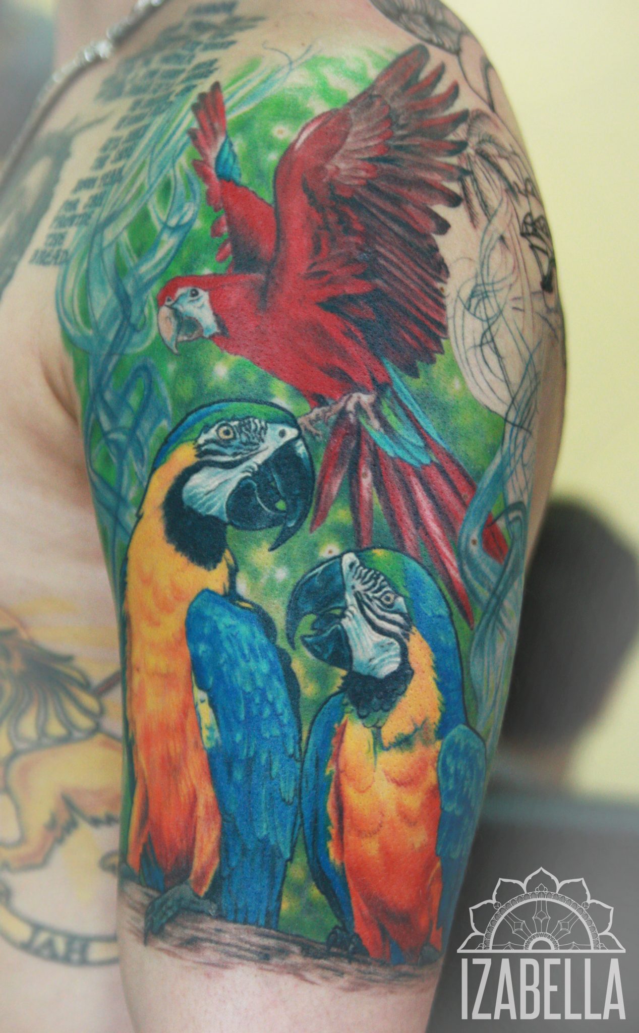 Vibrant tattoo featuring two macaws in bright blue and yellow colors, perched beside a striking red parrot in mid-flight, surrounded by green leaves and intricate background details, capturing the essence of tropical wildlife.