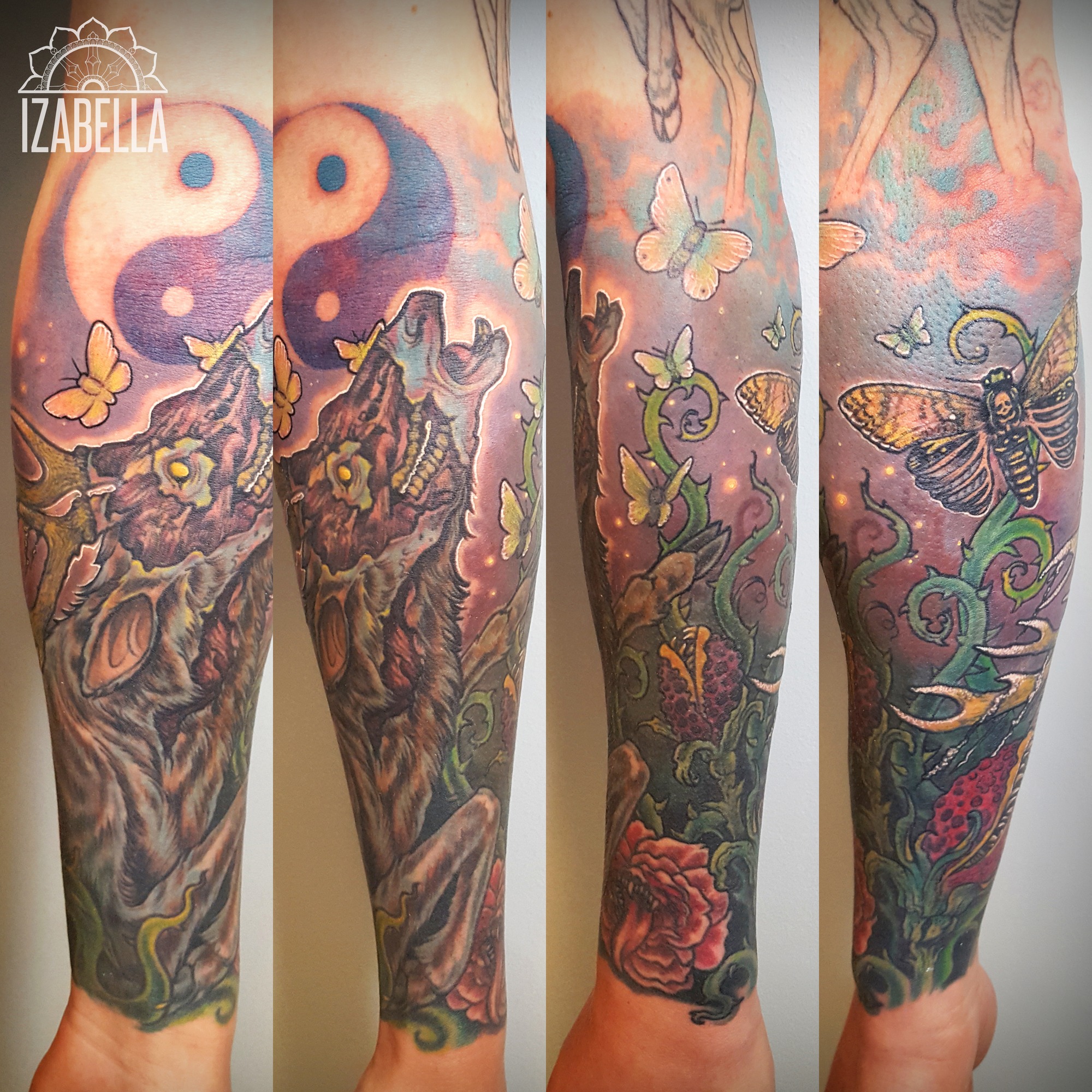 A vibrant tattoo featuring a wolf's head howling during a full moon, surrounded by butterflies and floral elements. The design includes intricate vines and colorful flowers, blending nature and mystical elements in a lively color palette.