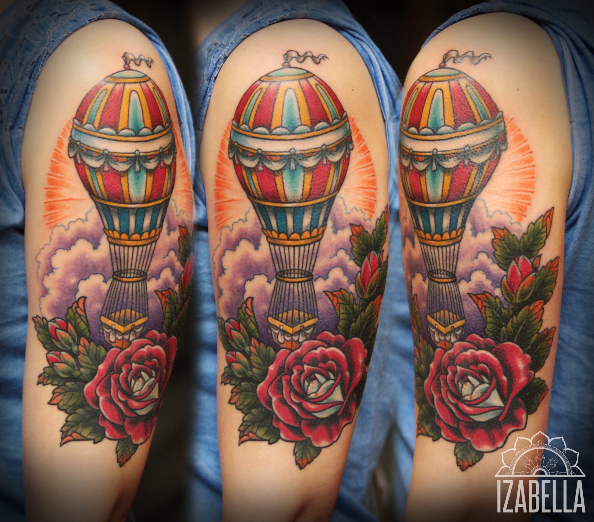 A colorful tattoo featuring a vintage hot air balloon surrounded by vibrant clouds and blooming red roses. The balloon is detailed with bold stripes and intricate designs, and the background includes soft pastel colors that enhance the whimsical theme of freedom and adventure.