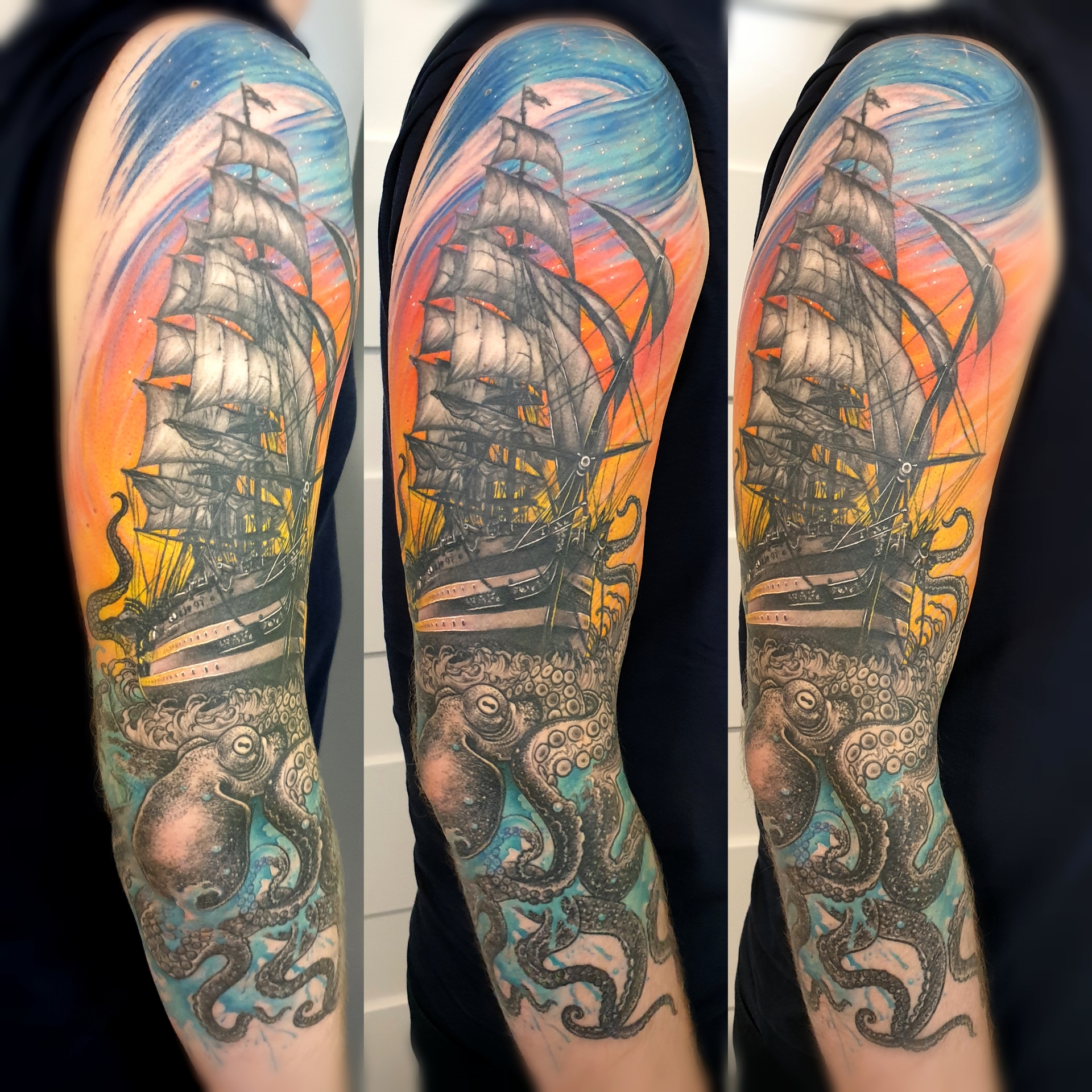 A vibrant tattoo featuring a large ship with multiple sails against a swirling sky of orange, blue, and pink hues. Below the ship, an intricate octopus is depicted, showcasing detailed tentacles and textures. The tattoo is located on the upper arm, highlighting the contrast between the bright colors of the sky and the detailed black and white elements of the ship and octopus.