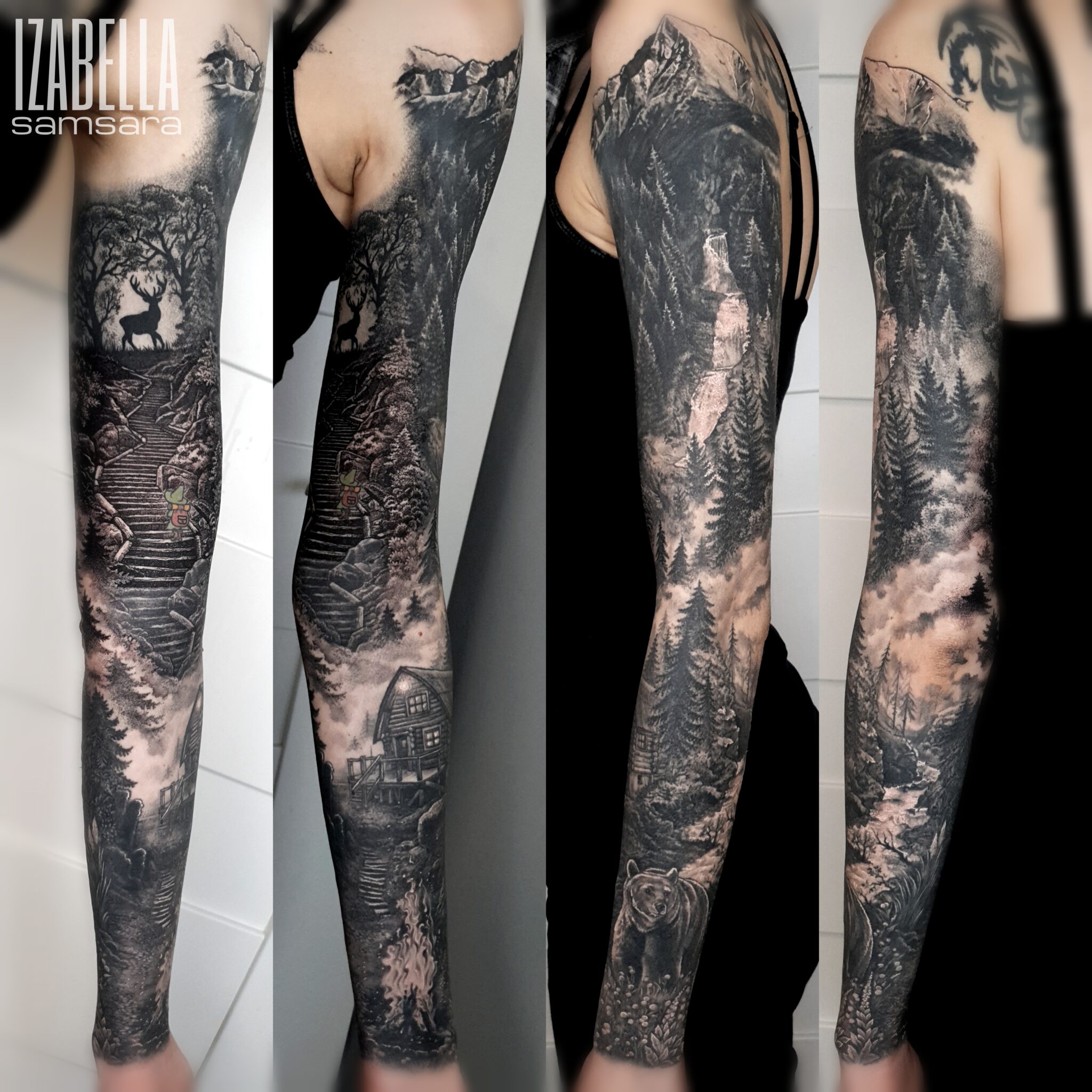 Detailed black and grey tattoo sleeve featuring a serene mountain landscape with tall trees, a cabin by a lake, a bear, and a deer silhouette among a forest backdrop. The tattoo showcases intricate shading and fine lines, capturing the essence of nature with realistic elements and a mystical atmosphere.