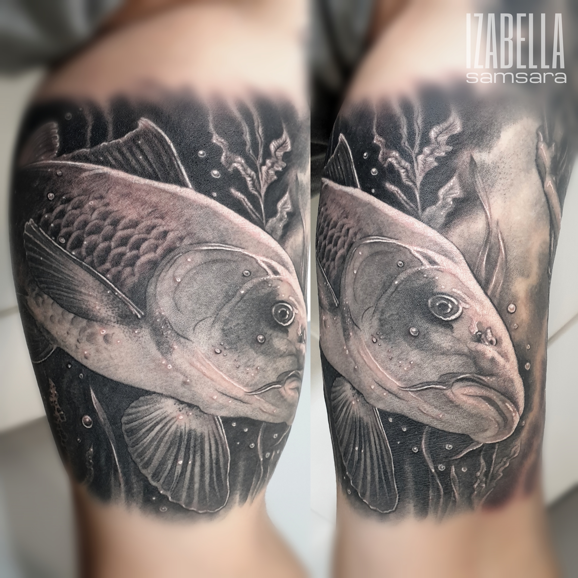 A detailed black and gray tattoo of a realistic fish swimming in water. The fish features intricate scales and expressive eyes, surrounded by bubbles and aquatic plants, creating a lifelike underwater scene.