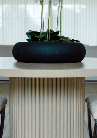 Custom reeded white oak round entry table with fluted pedestal base, handcrafted in Oklahoma City