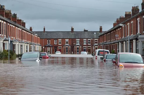 street flooded, flooding, flood, floods, flash floods, houses flooding, UK home flooded, UK Street underwater