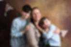 Linda Woodard with her sons in her studio